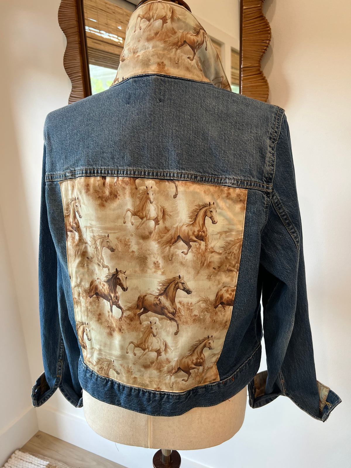 Back of horse-print denim jacket