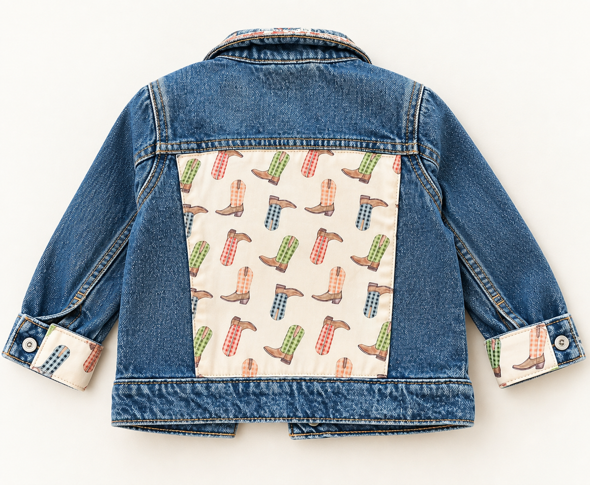 Children's embellished denim jacket with colorful cowboy boot textile back panel